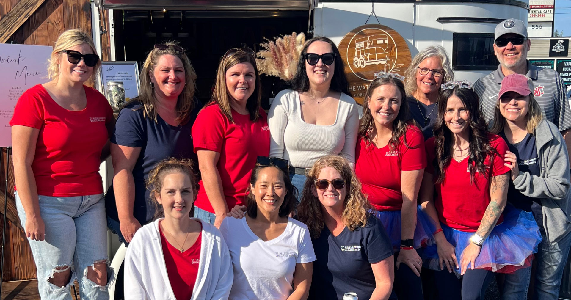 St. Helens Dental Team posing outside at a group function